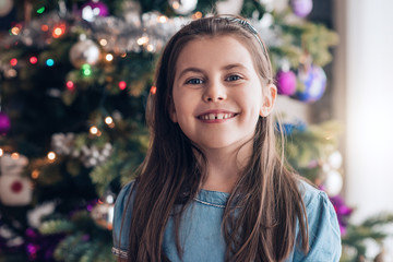 Smiling little girl on Christmas morning