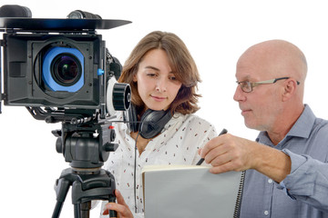 young woman cameraman and the mature man