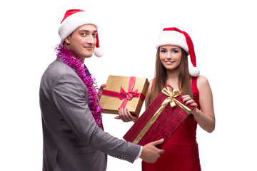 Pair celebrating christmas in the office isolated on white