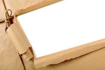 Torn brown paper package parcel background tied with string or rope white strip opening ripped...