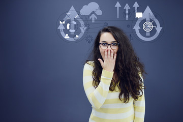 Young woman with background with drawn business chart, arrow and icons.