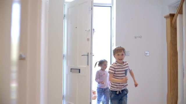Excited Children Returning Home With Mother