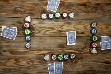 Playing poker on the old wooden table
