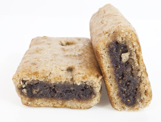 Isolated stack of vegan pomegranate fig bars.