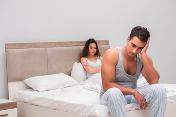 Obraz premium Family conflict with wife and husband in bed