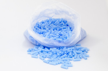 Obraz na płótnie Canvas Blue plastic bead in bag