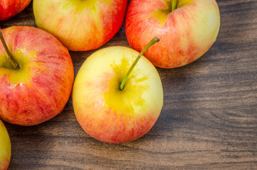 Isolated of apples on wooden table