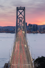 Aerial View of San Francisco-Oakland Bay Bridge at Sunset. Vertical View of San Francisco-Oakland Bay Bridge from Yerba Buena Island. © Yuval Helfman
