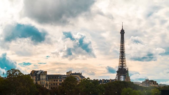 Stormy Paris Time-lapse. A storm clears as billowing clouds pass over the Eiffel Tower in Paris, France.
