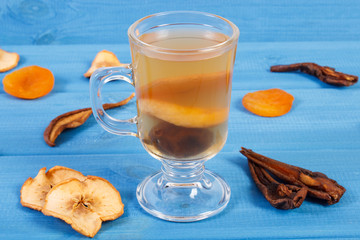 Fresh traditional compote of dried fruits and ingredients on boards