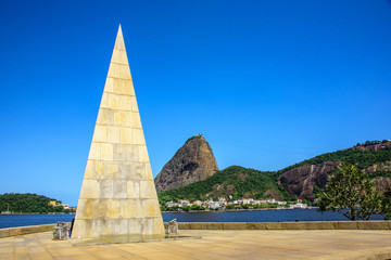 Pyramid Estacio de Sa in Park Flamengo, Aterro on the background of Sugarloaf mountain, Rio de Janeiro, Brazil