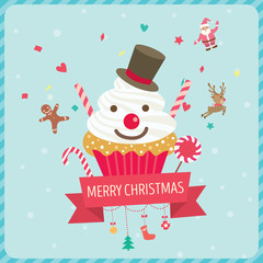 Cupcake snowman decorated with ribbon and ornaments for Christmas card.