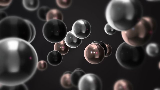 3D Spheres Moving Slowly On A Dark Background