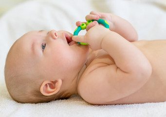teething at the beautiful boy.