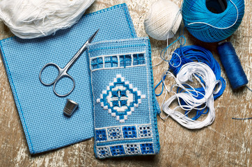 Hardanger embroidery blue and white colors with instruments