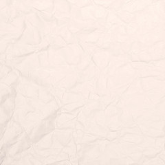 Crumpled light brown paper texture or paper background for design with copy space for text or image.