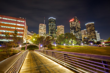 Fototapeta na wymiar Night landscape of Downtown Houston at night from Buffalo Bayou park
