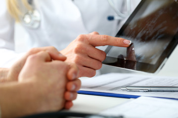 Female medicine doctor hands hold and show digital tablet pc