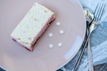 Raw cashew cake (cheesecake) and berries (strawberries, cherries), lavender on a wooden background. . Perfect for the detox diet or just a healthy dessert.  Love for a healthy raw food concept.