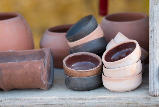 Set of old fashioned ceramic bowls and pots