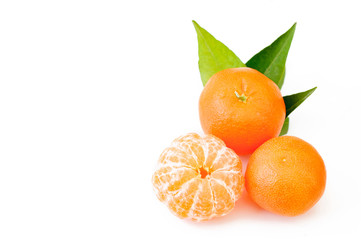 Peeled and fresh fruit with leaf  tangerines or mandarin isolate