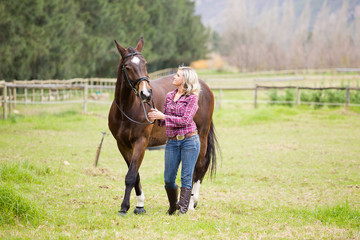 Beautiful elegance back woman cowgirl, riding a horse wearing bl