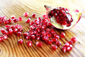 pomegranate seed wood background