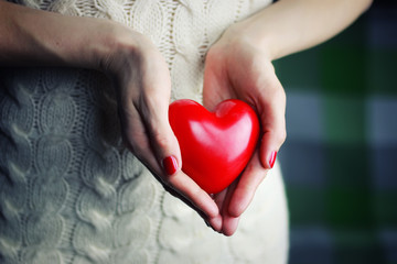 female hand valentine heart