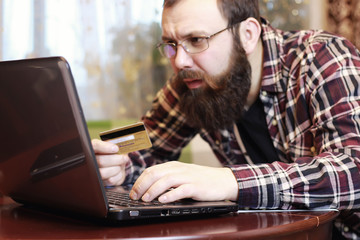 Fototapeta na wymiar male online card bearded