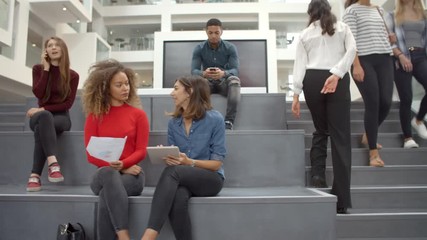 Interior Of Busy University Campus Building With Students