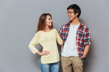Naklejka premium Portrait of a happy interracial couple looking at each other