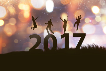 People silhouette celebrate 2017 new year