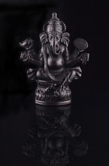 Fototapeta premium Ganesha Statue Lord of Success isolated on black background