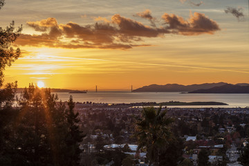 Panorama Golden Glow Sunset of San Francisco Bay looking over East Bay Berkeley