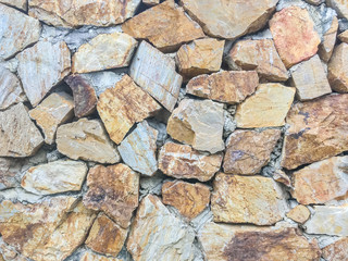 Closeup surface brick pattern at old stone brick wall textured background