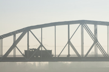 Fototapeta na wymiar Locomotive on a Bridge