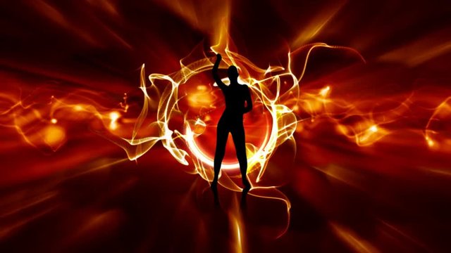Young girl dancing with flames