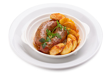 Sausages and potatoes  isolated on the white background.