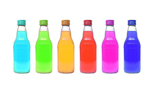 Colorful bottles of soft drinks isolated