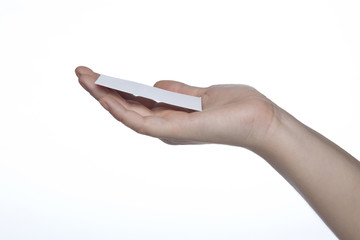 White card given on hands, copy space - obrazy, fototapety, plakaty