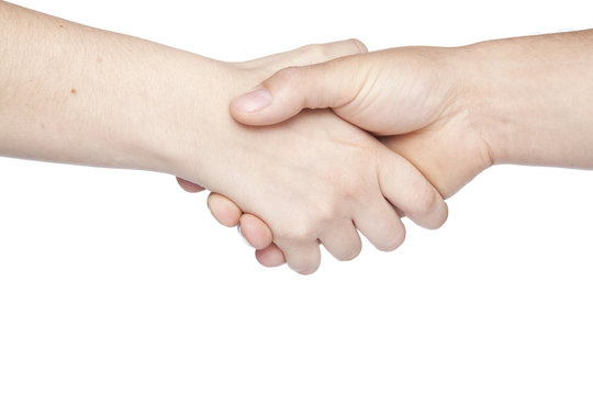 a traditional gesture of shaking hands copy space