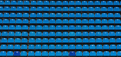 Seats at the stadium - 128585836