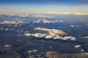 Naklejka na ściany i meble landscape from plane window of high mountain in italy after plan