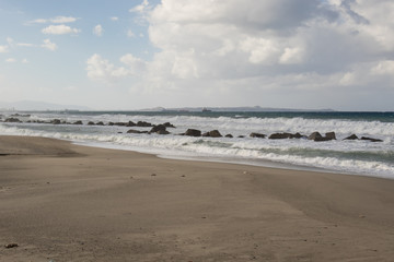Fototapeta na wymiar The beach with the sea in storm