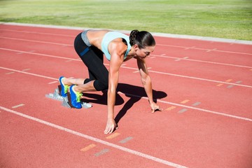 Female athlete ready to run