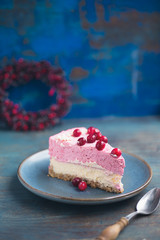 Festive cranberry cheescake with fresh berries.