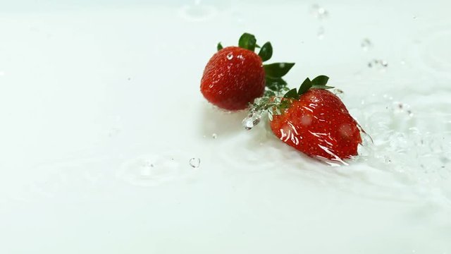 Strawberries, fragaria vesca, Falling on Water, Slow Motion 4K