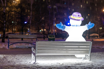 The Snowman on the bench.