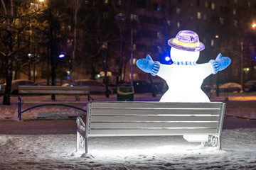 The Snowman on the bench.