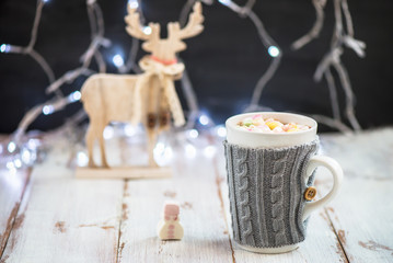 Christmas Setting with Hot Chocolate in a Fancy Sweater Mug